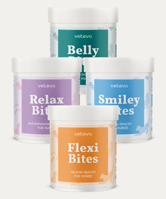 Vier Vetevo-Dosen mit Haustier-Snacks, etikettiert als Belly, Relax, Smiley, Flexi Bites.